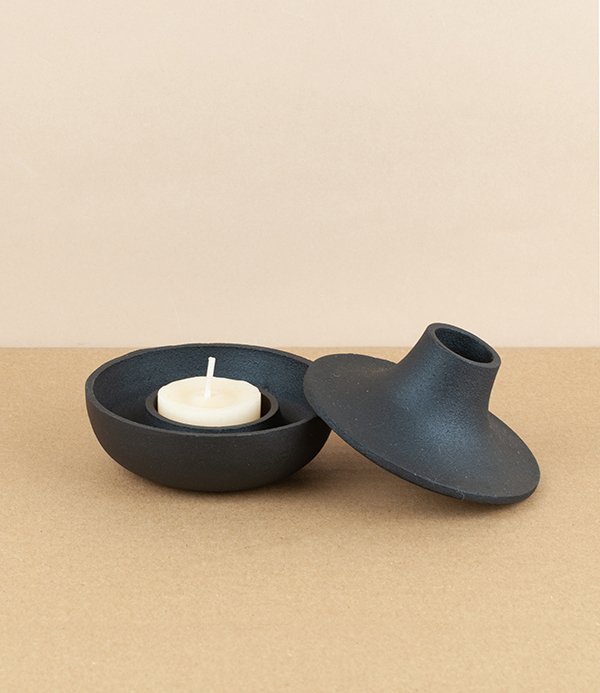Cast iron candle holder