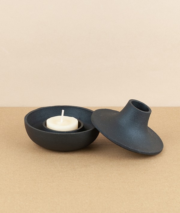 Cast iron candle holder