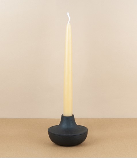 Cast iron candle holder