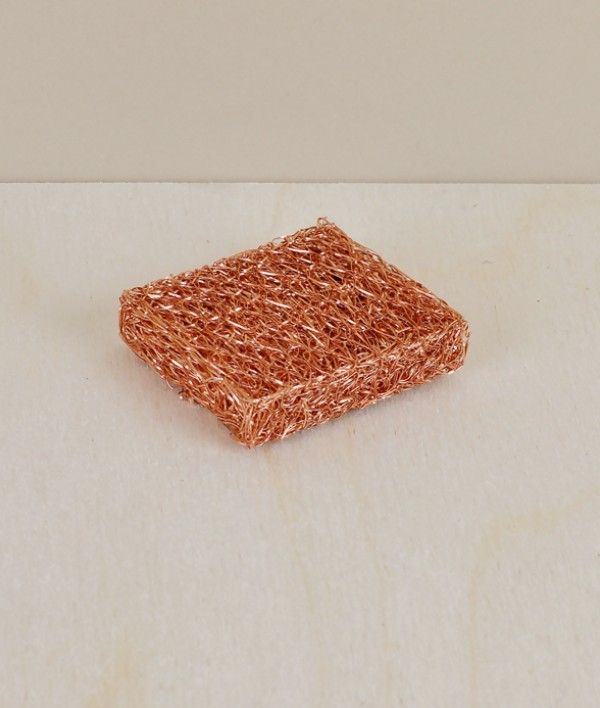 Compact copper scouring pad