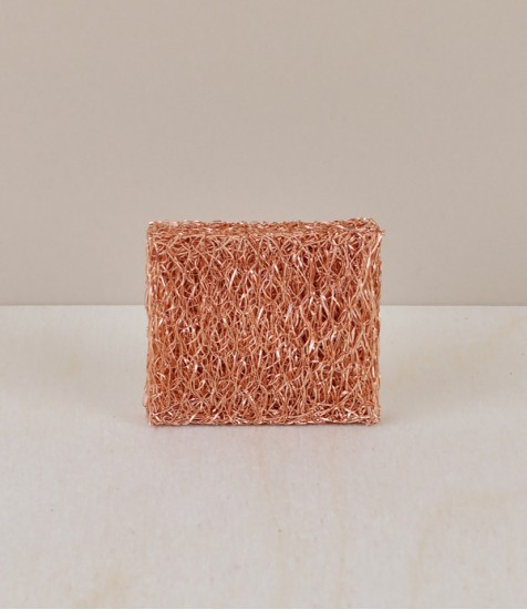 Compact copper scouring pad