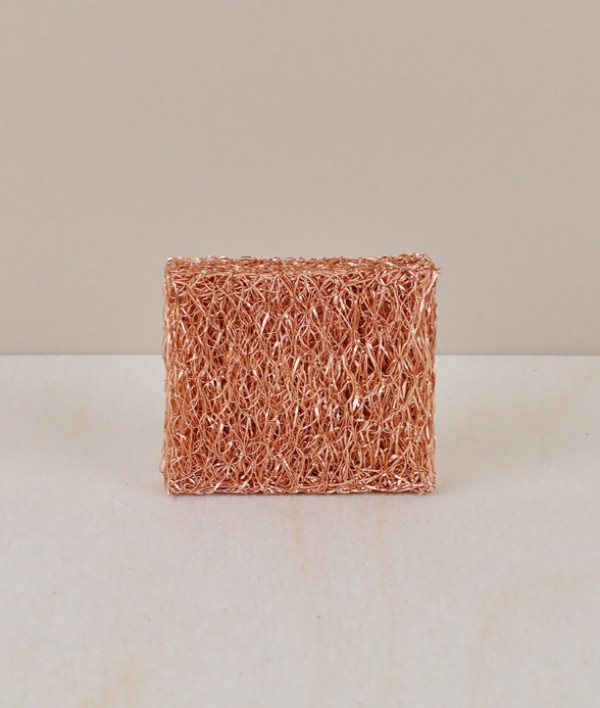 Compact copper scouring pad