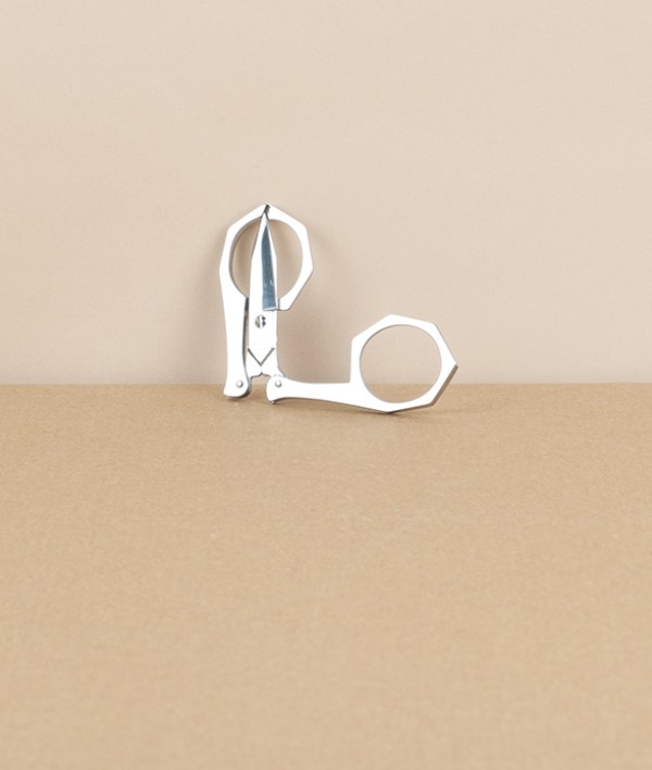 French folding scissors, red leather case