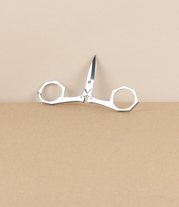 French folding scissors, red leather case