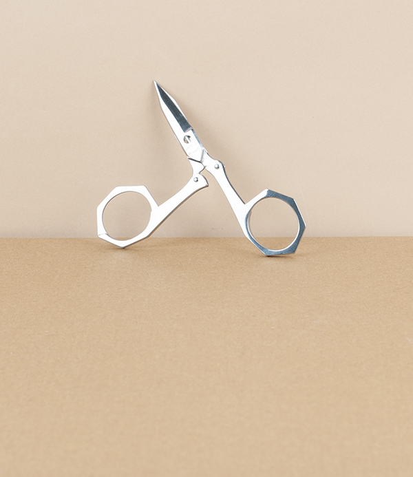 French folding scissors, red leather case