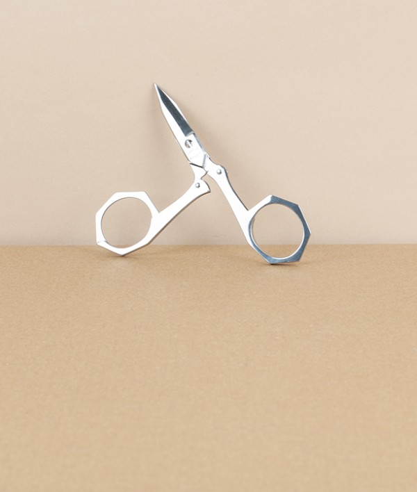 French folding scissors, red leather case