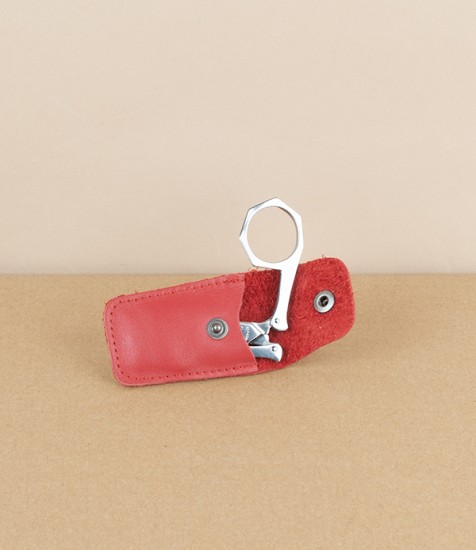 French folding scissors, red leather case