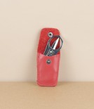 French folding scissors, red leather case