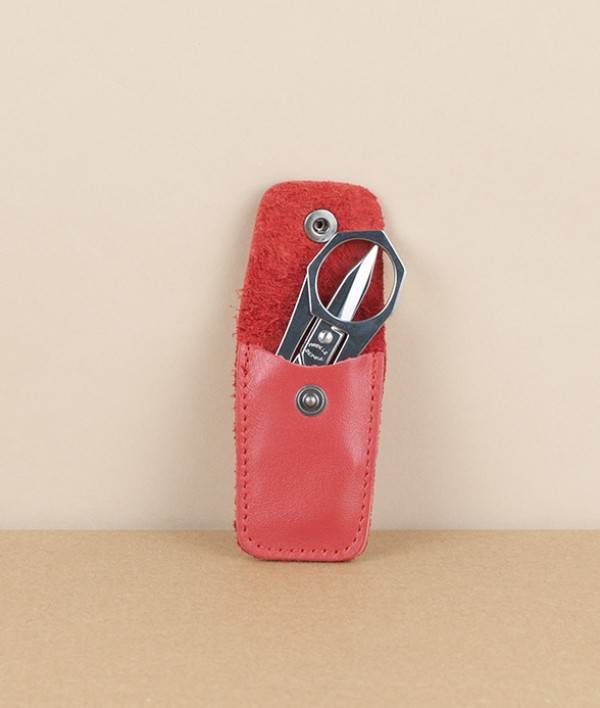 French folding scissors, red leather case