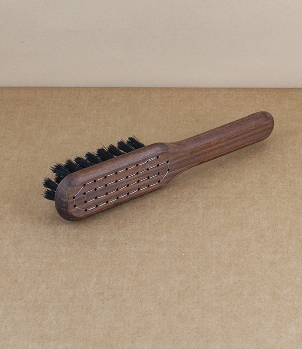 Oiled walnut hand stitched beard brush