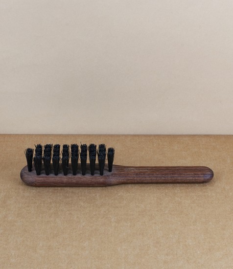 Oiled walnut hand stitched beard brush