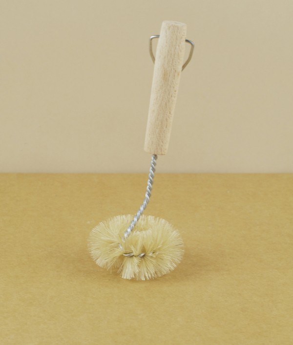 Twisted wire and natural bristle sink brush